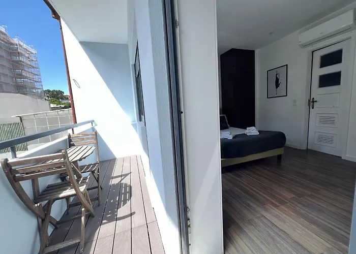 Almada Studios & Suites